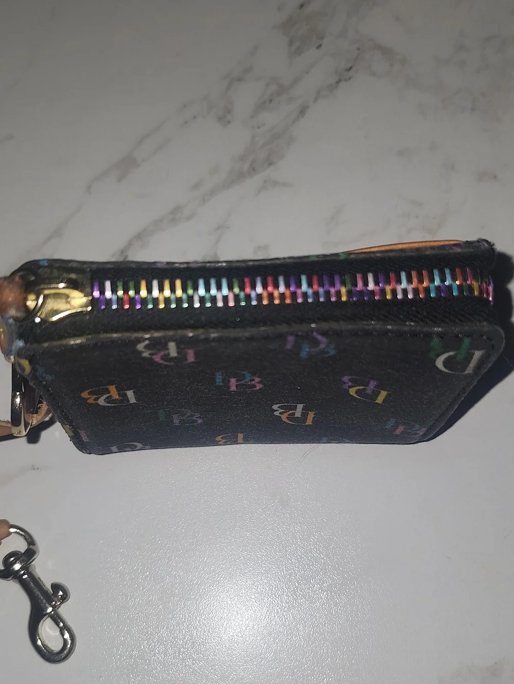 Dooney & Bourke black rainbow monogram wristlet